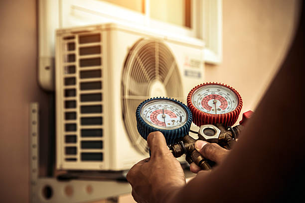 Professional Air Conditioning Service technician working in Dandridge, TN
